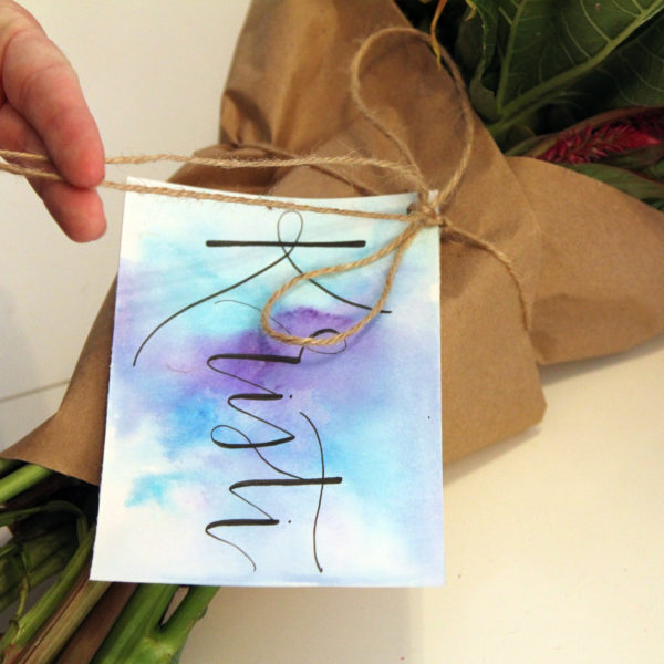 Calligraphy card on bouquet