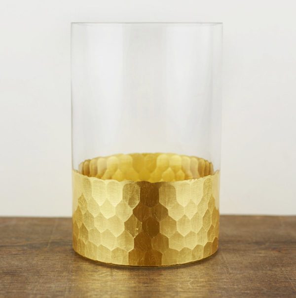 Glass vase with gold honeycomb pattern at bottom.