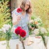 Amanda Kitaura of Bloom Sacramento arranging a DIY bouquet of locally grown flowers.