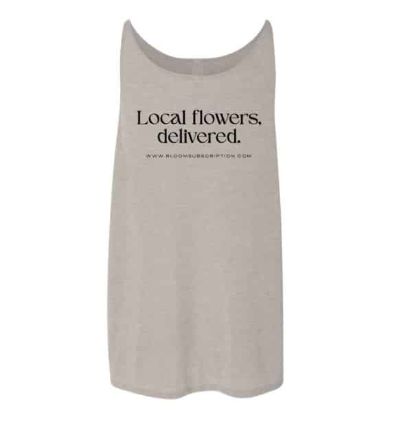 Heather stone colored tank top with text "Local flowers, delivered" on the back