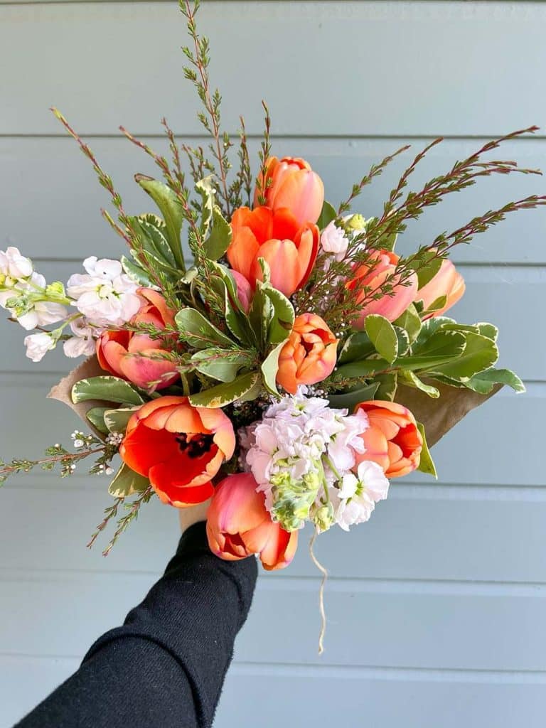 Wrapped bouquet of tulips made by Bloom Sacramento