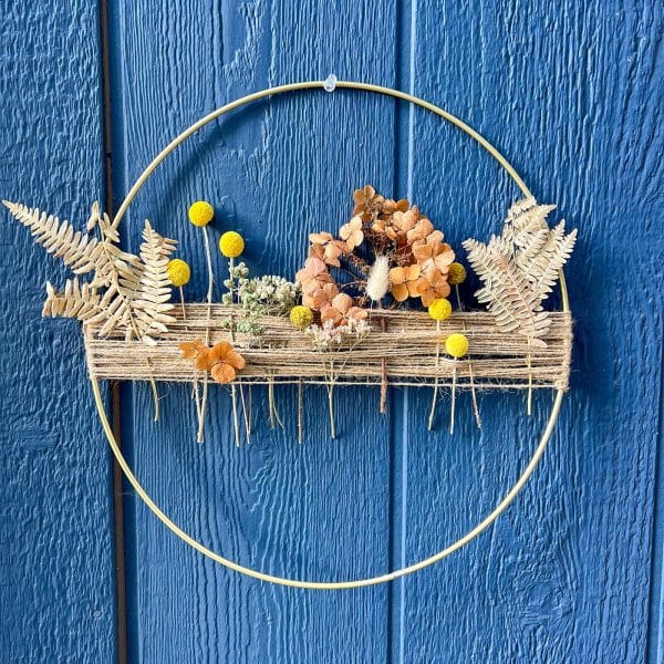 Gold hoop with dried flowers